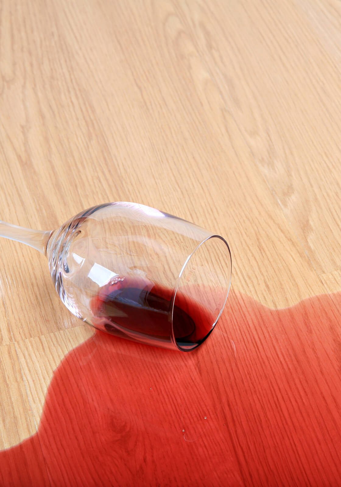 Red wine spill cleaning on laminate flooring | All Floors & More